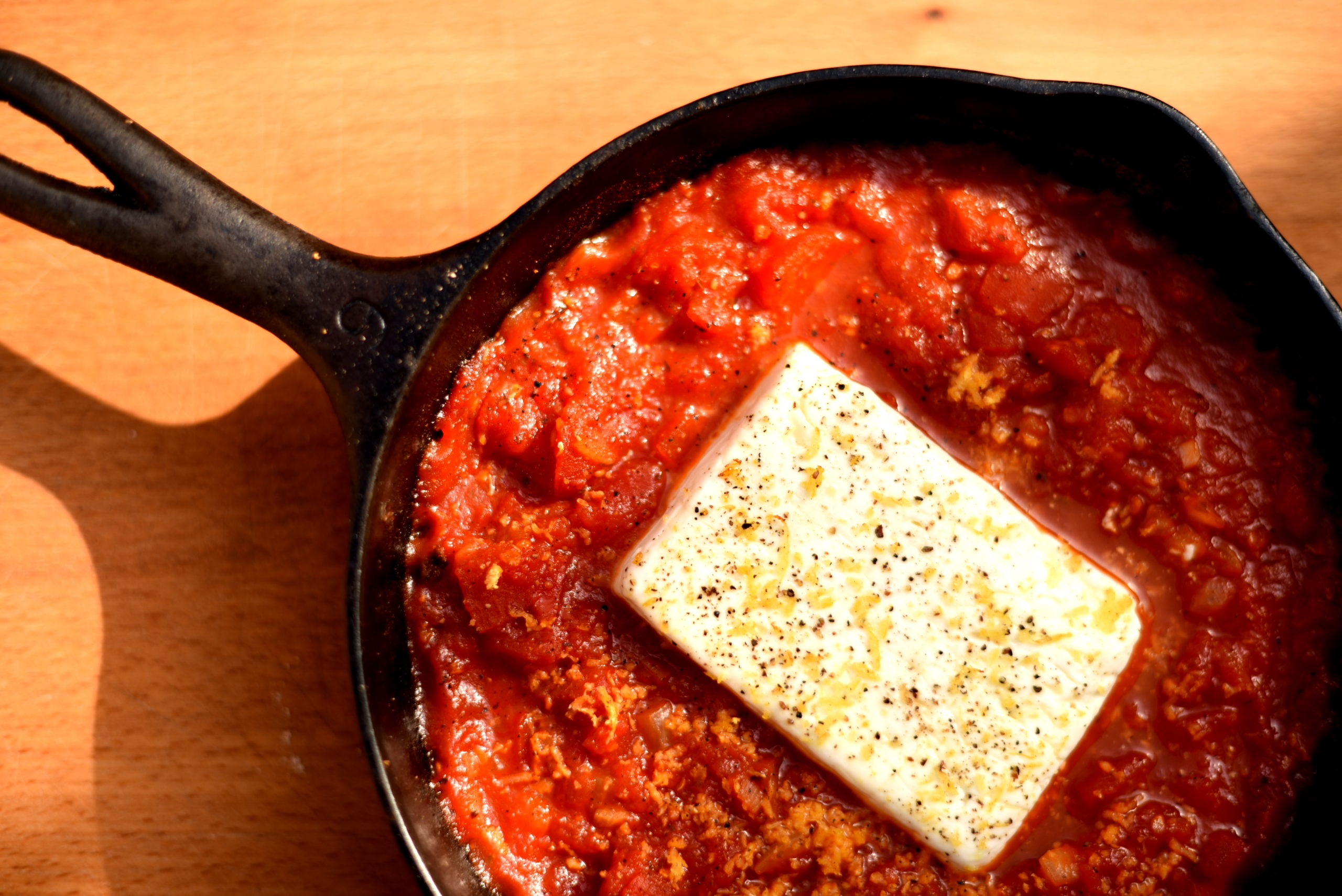 Roasted feta with tomatoes