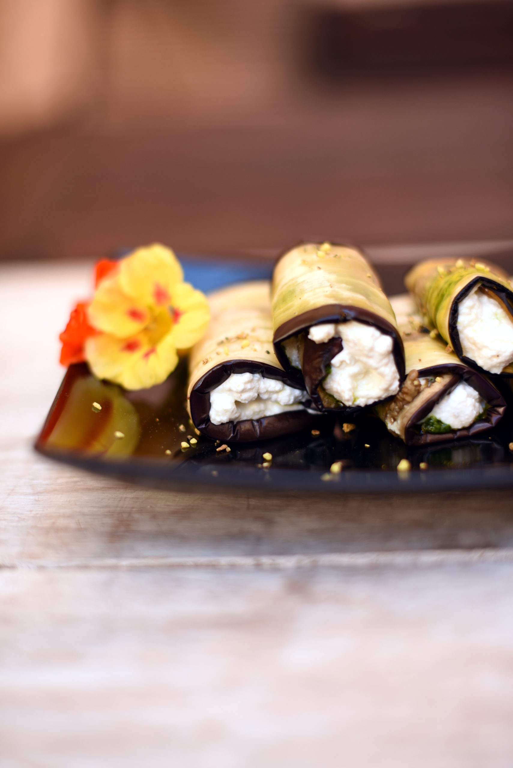 Aubergine involtini with nasturtium pesto and lemon ricotta