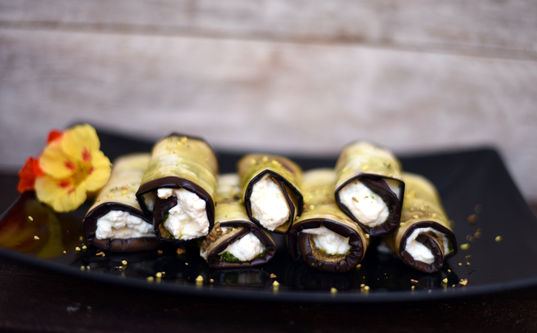 Aubergine involtini with nasturtium pesto and lemon ricotta